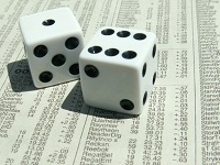 gambling-stock-dice-newspaper